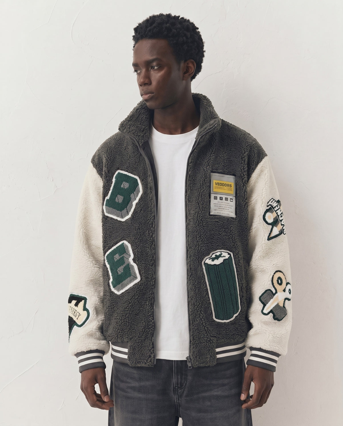 Blouson université gris porté