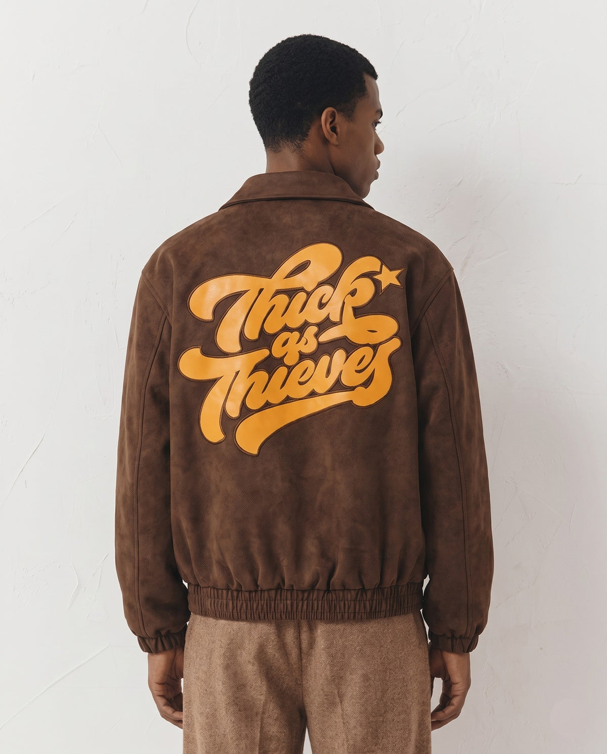 Veste american baseball marron vue de dos